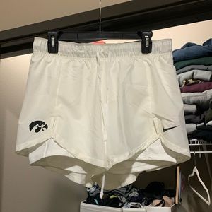 White Hawkeye Nike dri fit running shorts with built in spandex